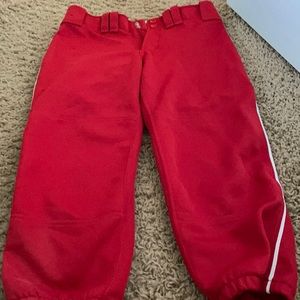 Mizuno red with white piping belted women’s softball pants